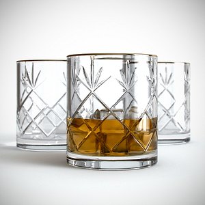 Crystal glass of whiskey with ice