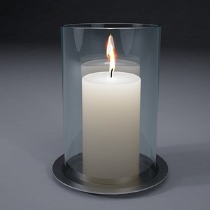 White candles in glass jar