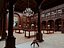 Scena d'interni di una lussuosa biblioteca reale europea in stile classico.