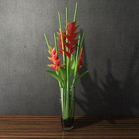 heliconias in glass vase
