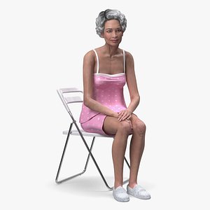 Asian Old Lady in Sleeping Suit Sitting