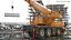 Liebherr Mobilkranfahrzeug mit montierten Betonbarrieren