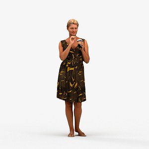 00410Noelle005 - Adult Caucasian woman drinking coffee at home in casual summer clothing