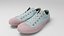 Par de zapatillas o gumshoes de mujer en lona rosa y blanca, calzado urbano hipster