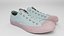 Par de zapatillas o gumshoes de mujer en lona rosa y blanca, calzado urbano hipster