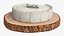 Round Brie Cheese with Rosemary on Rustic Board
