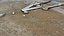 Gravel Wood Planks 01 - Scansione del modello di fotogrammetria 3D di ghiaia bagnata con assi di legno e un guanto