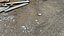 Gravel Wood Planks 01 - Scansione del modello di fotogrammetria 3D di ghiaia bagnata con assi di legno e un guanto