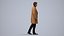 00121Rian003 - Adult Caucasian male walking through public space in winter business attire