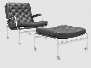 Karin easy chair and ottoman black leather by Bruno Mathsson