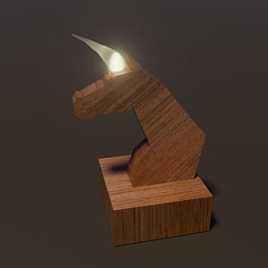 Wooden statue of horse head with lamp horn