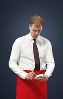 Mistery A Caucasian Male Waiter Standing While Taking An Order
