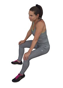 Woman in Sportswear sitting