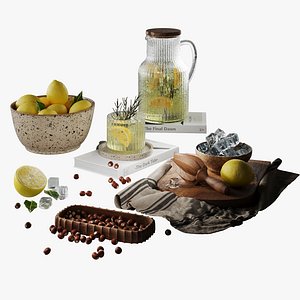 Lemonade still life set with glass pitcher and kitchen props