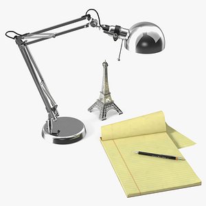 Work Desk Setup with Lamp and Souvenir