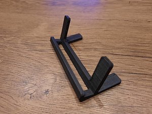 Bed phone holder