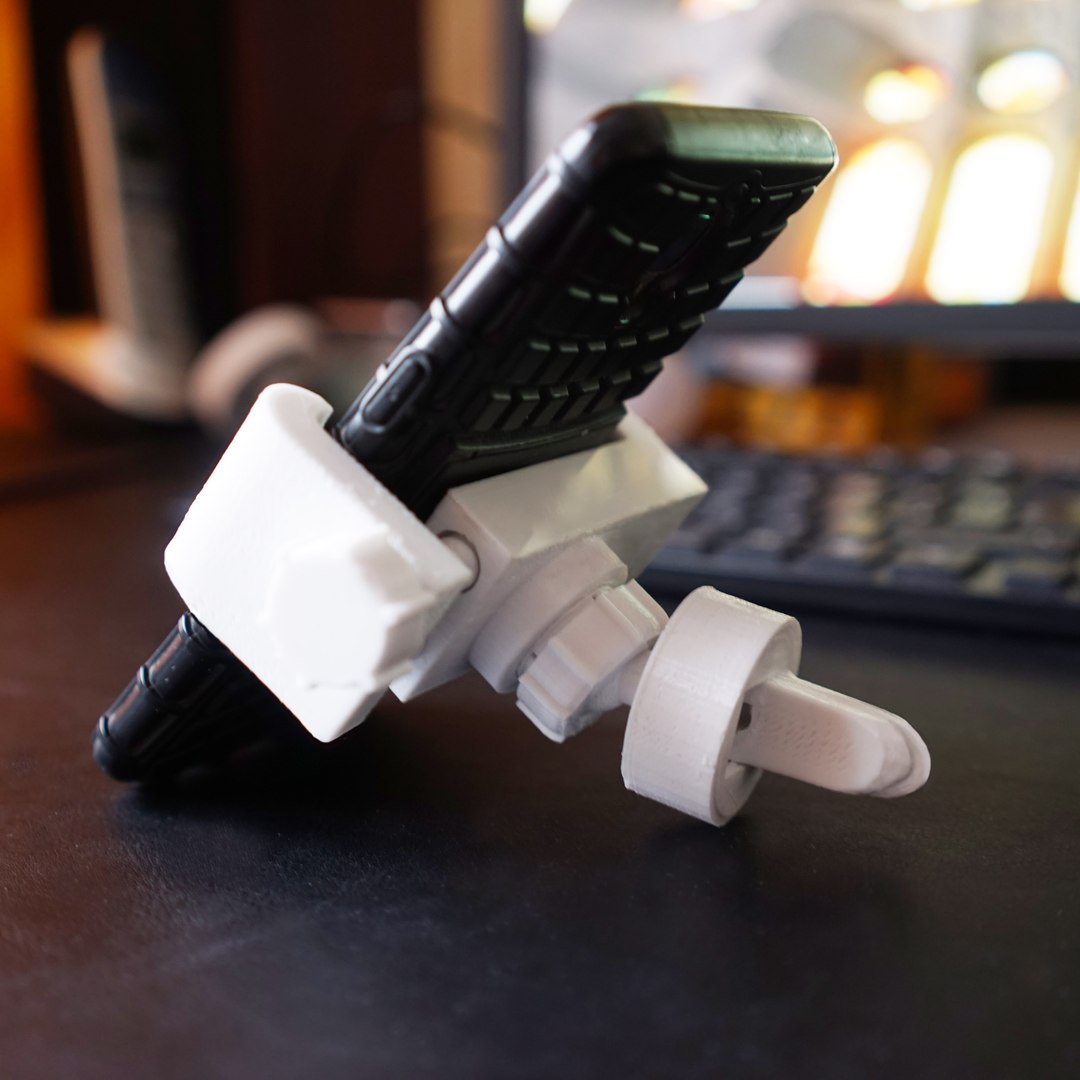 3D smartphone holder model https://p.turbosquid.com/ts-thumb/EO/4b10FY/5Bv0GwwV/photo04/jpg/1575559910/1920x1080/fit_q87/29a129d58776929248560a726e235d6c926ca268/photo04.jpg