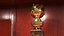 Prezentacja z podświetlanymi trofeami w kolorze brązowym