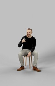 Sitting Man Casual Master Taking a Selfie with his Cell Phone