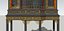 A GEORGE II BLACK CABINET