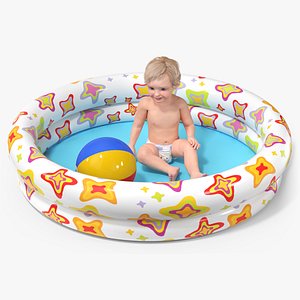 Baby Boy in an Inflatable Pool with Ball