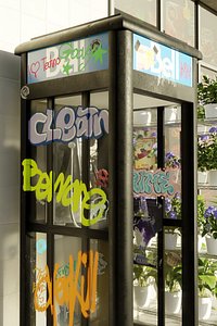 City Phone Booth Day and Night