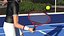 Raqueta de tenis roja con pelota de tenis