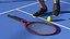 Raqueta de tenis roja con pelota de tenis