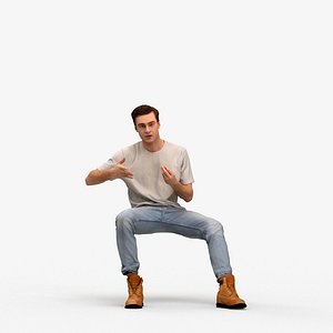 00516Gael011 - Adult Caucasian man sitting casually at home talking in transitional seasonal clothin