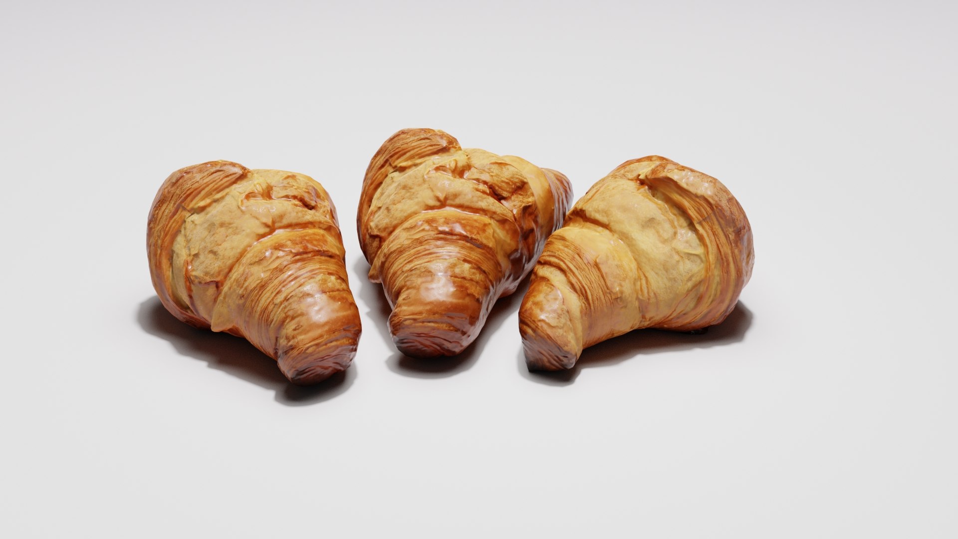 3D Croissants https://p.turbosquid.com/ts-thumb/Ik/rgy0Lp/Kj/contextimage0003/jpg/1632655951/1920x1080/fit_q87/93f61f705394aa4eaa9afdeb91eb3762692eff3f/contextimage0003.jpg