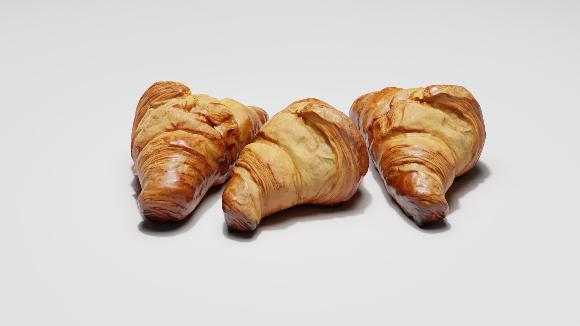 3D Croissants https://p.turbosquid.com/ts-thumb/Ik/rgy0Lp/qx/contextimage0000/jpg/1632655950/1920x1080/fit_q87/62bf7c619f777f4fc81d868a6043bf673aa237be/contextimage0000.jpg