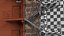 Fire Escape Black with Brick Wall of House