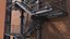 Fire Escape Black with Brick Wall of House