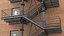 Fire Escape Black with Brick Wall of House