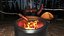 Campfire Fire Pit with Sausages on Sticks