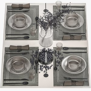 Table setting with a bouquet of blueberry branches