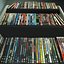 149 DVDs y estante