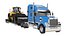 Freightliner Hauling a Loader model