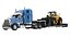 Freightliner Hauling a Loader model