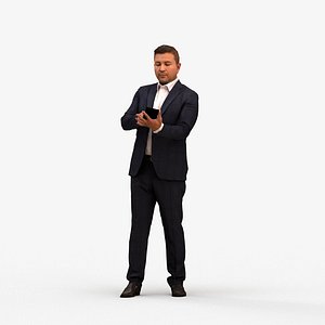 00573Omar007 - Adult Middle Eastern man standing in office with smartphone autumn attire