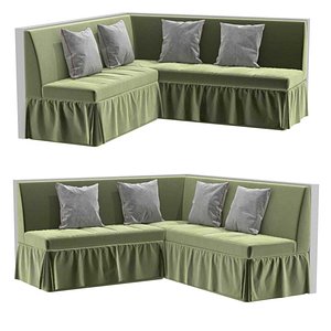 Custom made green velvet corner sofa with skirting