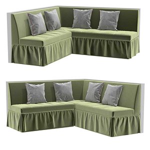 Custom made green velvet corner sofa with skirting