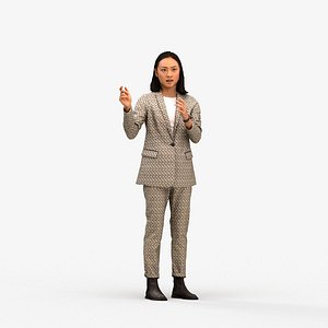00325Xia005 - Adult Asian woman presenting in office wearing transitional seasonal business attire