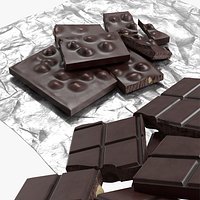 Dark Broken Nut Chocolate Pieces on Foil Sheet