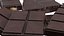 Dark Broken Nut Chocolate Pieces on Foil Sheet