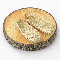 Bast Shoes on Saw Wooden Stump