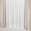 Curtains are brown with tulle