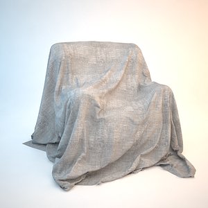 Armchair covered with sheet