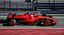 Czerwony samochód wyścigowy Formuły 1 2024 zespołu F1