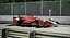 Czerwony samochód wyścigowy Formuły 1 2024 zespołu F1